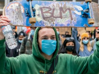 BLM written on skateboard at rally