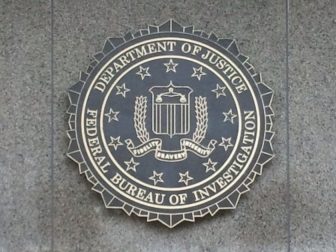 DOJ FBI Seal on granite wall