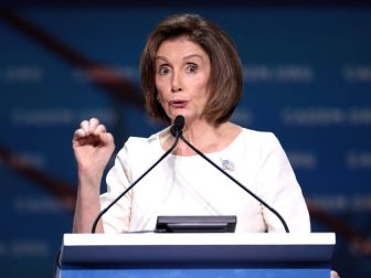 House Speaker Nancy Pelosi speaking from podium