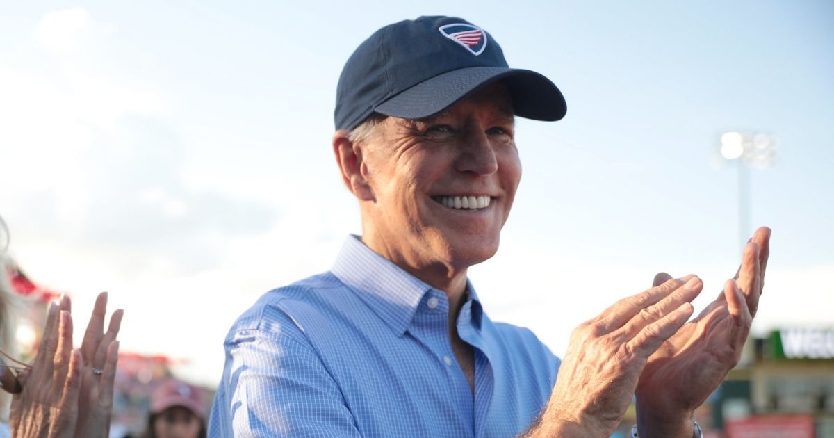 Joe Biden clapping at baseball game