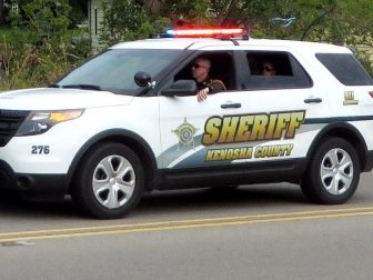 Kenosha County Sheriff SUV driving down street