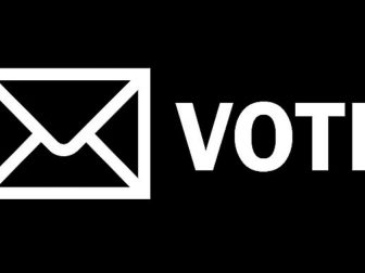 Black & White Mail Envelope and the word VOTE