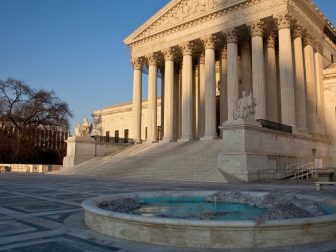 SCOTUS building with fountain out front