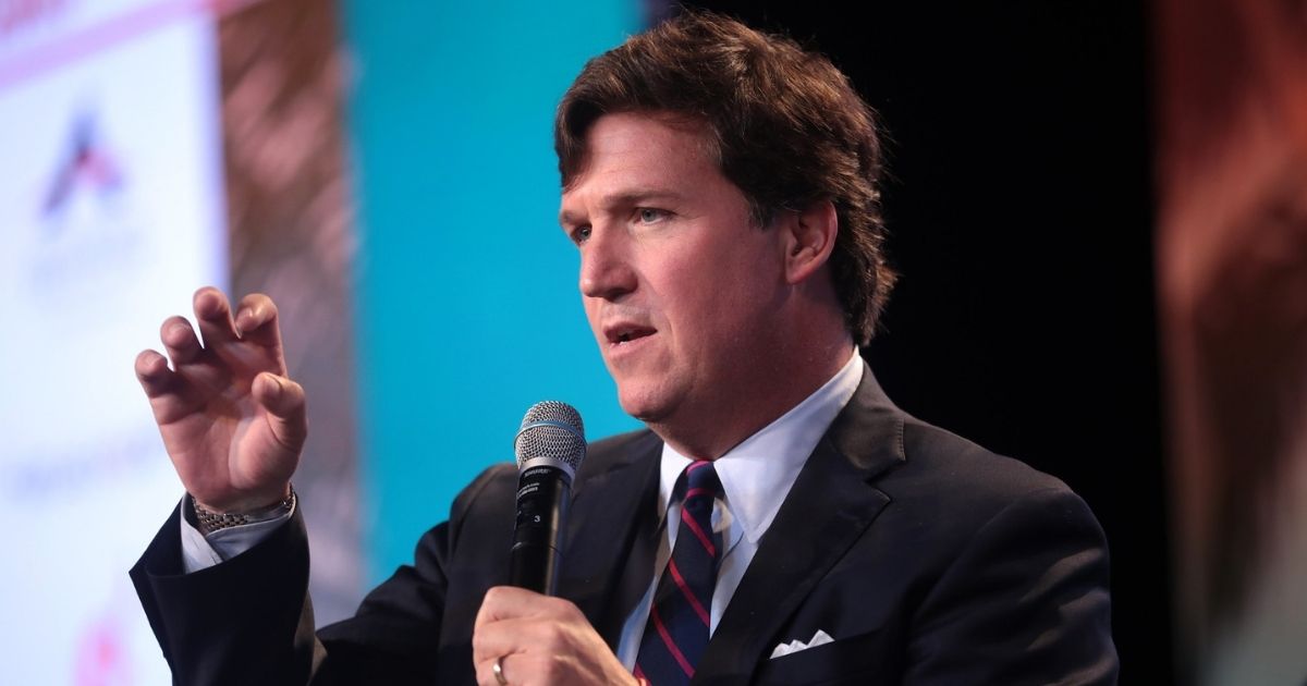 Tucker Carlson speaking with attendees at the 2018 Student Action Summit hosted by Turning Point USA at the Palm Beach County Convention Center in West Palm Beach, Florida.