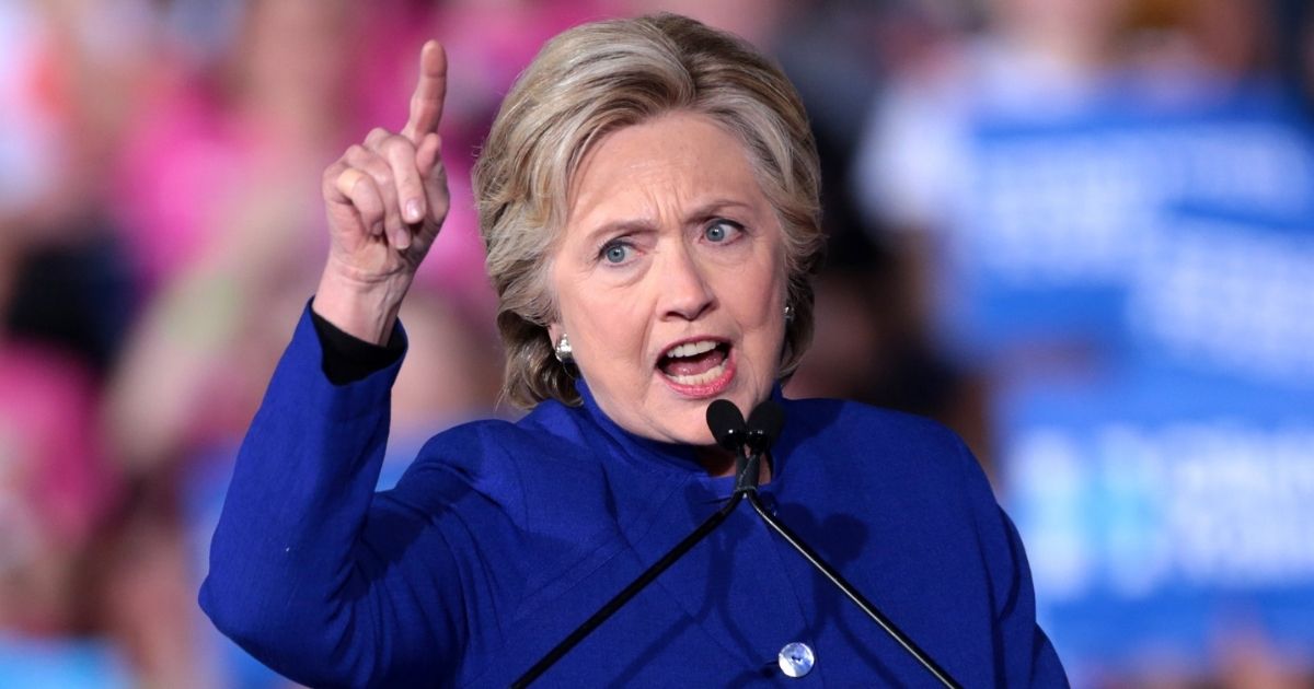 Former Secretary of State Hillary Clinton speaking with supporters at a campaign rally at the Intramural Fields at Arizona State University in Tempe, Arizona.