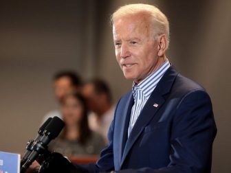 Former Vice President of the United States Joe Biden speaking with supporters at a town hall hosted by the Iowa Asian and Latino Coalition at Plumbers and Steamfitters Local 33 in Des Moines, Iowa.