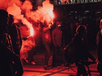 People walking through streets in protest