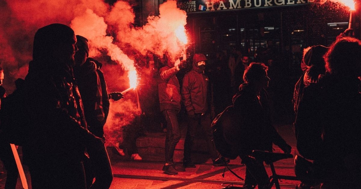 People walking through streets in protest