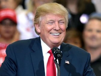 Donald Trump speaking with supporters at a campaign rally at the Phoenix Convention Center in Phoenix, Arizona.