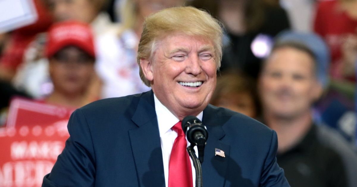 Donald Trump speaking with supporters at a campaign rally at the Phoenix Convention Center in Phoenix, Arizona.