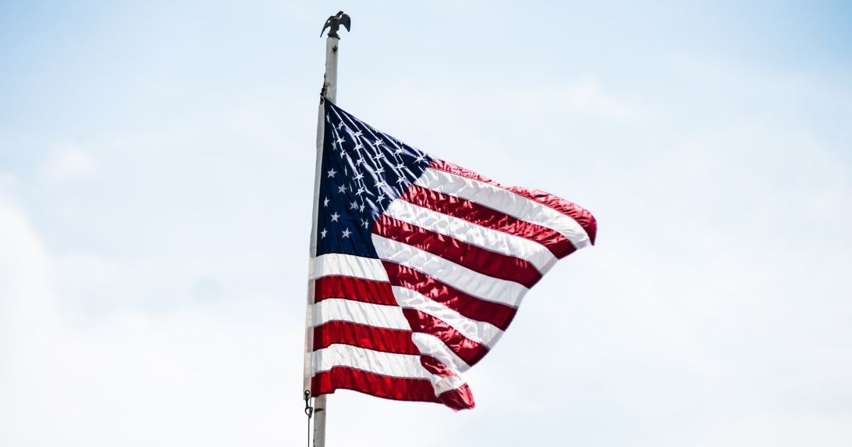 American flag flying in the wind.