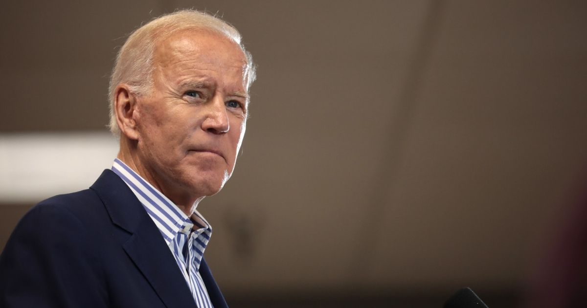 Former Vice President of the United States Joe Biden speaking with supporters at a town hall hosted by the Iowa Asian and Latino Coalition at Plumbers and Steamfitters Local 33 in Des Moines, Iowa.