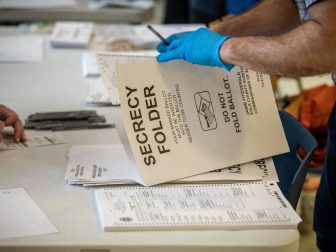 Voters in Des Moines precincts 43, 61 and 62 cast their ballots at Roosevelt High School.