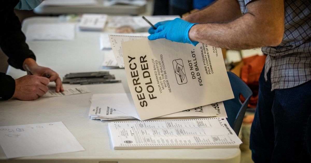 Voters in Des Moines precincts 43, 61 and 62 cast their ballots at Roosevelt High School.