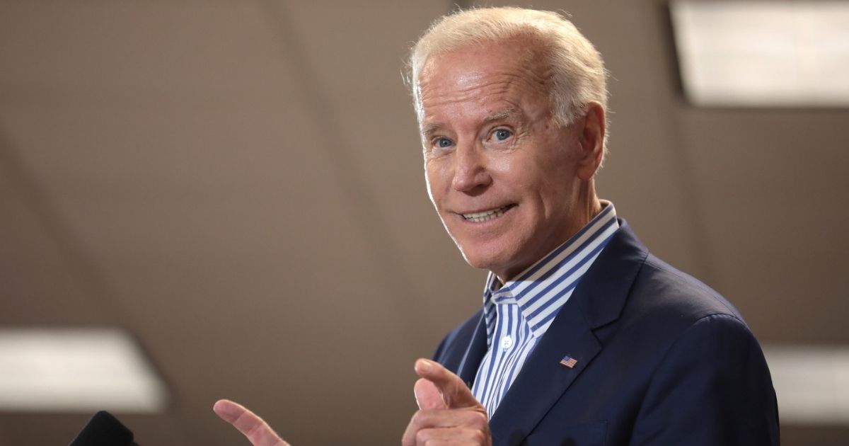 Former Vice President of the United States Joe Biden speaking with supporters at a town hall hosted by the Iowa Asian and Latino Coalition at Plumbers and Steamfitters Local 33 in Des Moines, Iowa.