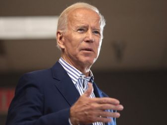 Former Vice President of the United States Joe Biden speaking with supporters at a town hall hosted by the Iowa Asian and Latino Coalition at Plumbers and Steamfitters Local 33 in Des Moines, Iowa.