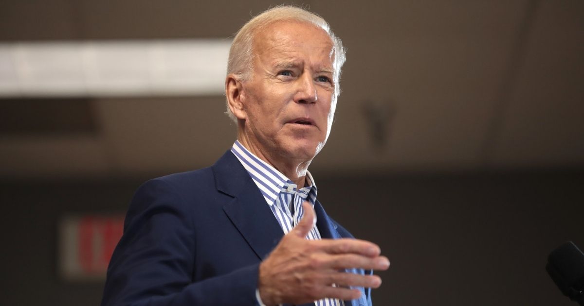 Former Vice President of the United States Joe Biden speaking with supporters at a town hall hosted by the Iowa Asian and Latino Coalition at Plumbers and Steamfitters Local 33 in Des Moines, Iowa.