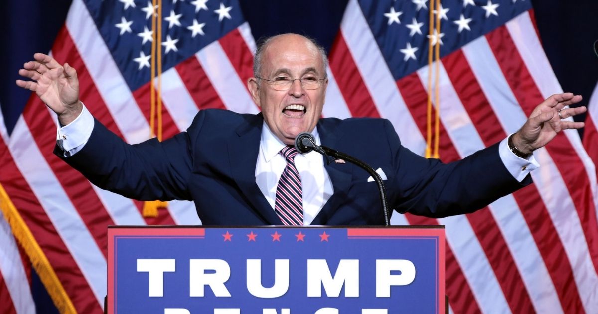 Former Mayor Rudy Giuliani of New York City speaking to supporters at an immigration policy speech hosted by Donald Trump at the Phoenix Convention Center in Phoenix, Arizona.