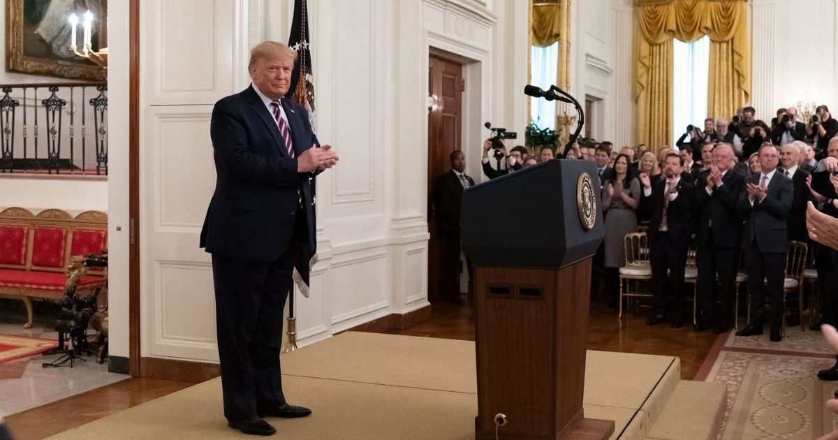 President Donald J. Trump is applauded as he arrives to addresses his remarks Thursday, Feb. 6, 2020 in the East Room of the White House, in response to being acquitted in the U.S. Senate Impeachment Trial. (Official White House Photo by Andrea Hanks)