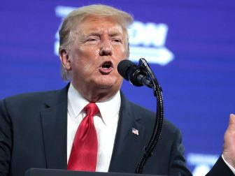 President of the United States Donald Trump speaking with supporters at an "An Address to Young Americans" event hosted by Students for Trump and Turning Point Action at Dream City Church in Phoenix, Arizona.