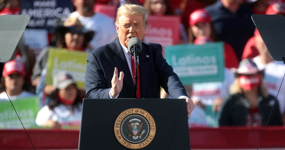 President of the United States Donald Trump speaking with supporters at a "Make America Great Again" campaign rally at Phoenix Goodyear Airport in Goodyear, Arizona.