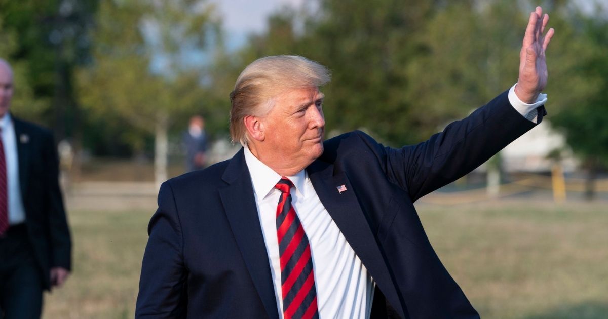 President Donald J. Trump disembarks Marine One at Port Covington Landing Zone in Baltimore, Thursday, Sep. 12, 2019, and departs en route to the Baltimore Marriott Waterfront. (Official White House Photo by Joyce N. Boghosian)