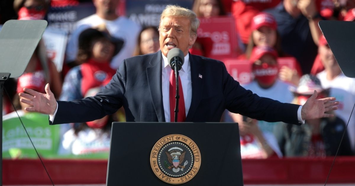 President of the United States Donald Trump speaking with supporters at a "Make America Great Again" campaign rally at Phoenix Goodyear Airport in Goodyear, Arizona.