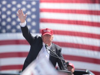 Donald Trump speaking with supporters at a campaign rally at Fountain Park in Fountain Hills, Arizona.