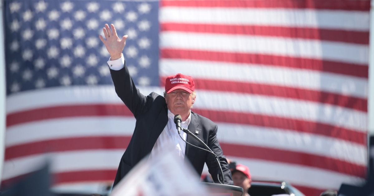 Donald Trump speaking with supporters at a campaign rally at Fountain Park in Fountain Hills, Arizona.