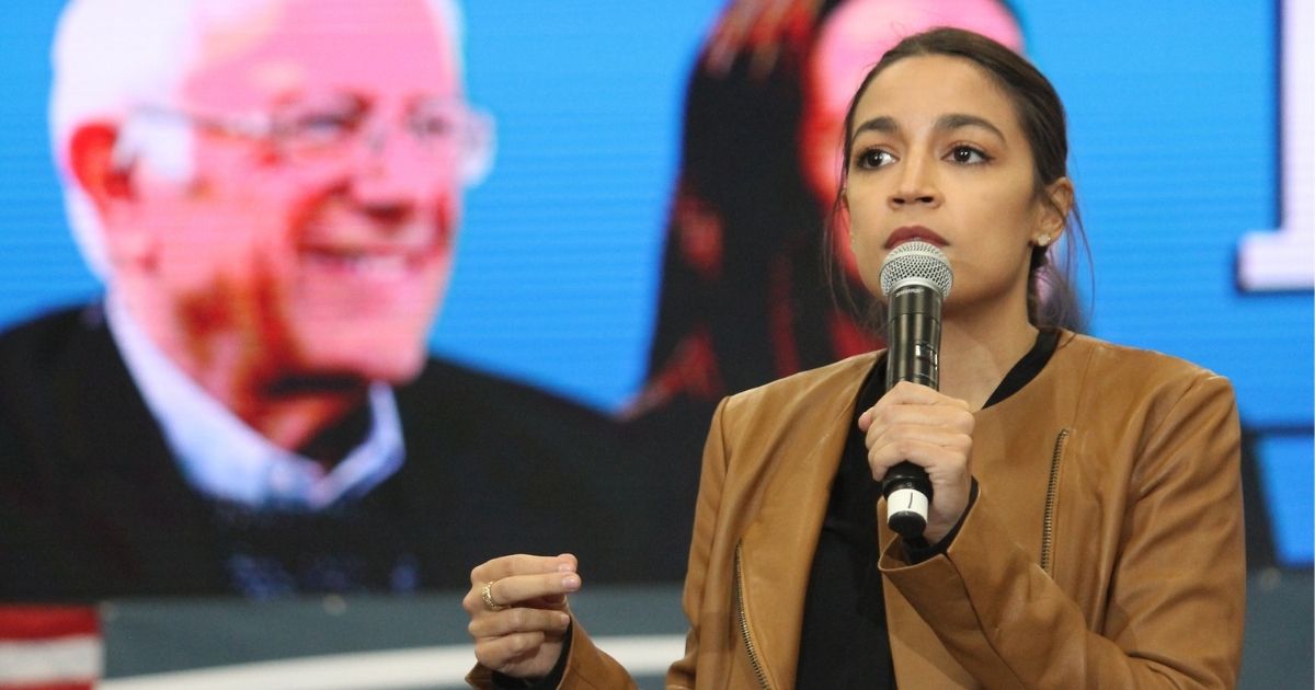 Rep. Alexandria Ocasio-Cortez speaking to attendees at a rally for Bernie Sanders in Council Bluffs, Iowa. Please attribute to Matt A.J. if used elsewhere.