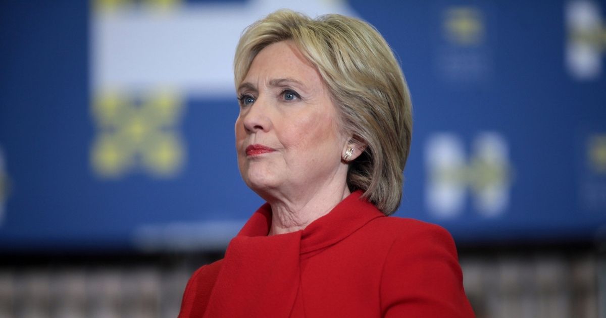 Former Secretary of State Hillary Clinton speaking with supporters at a "Get Out the Caucus" rally at Valley Southwoods Freshman High School in West Des Moines, Iowa.