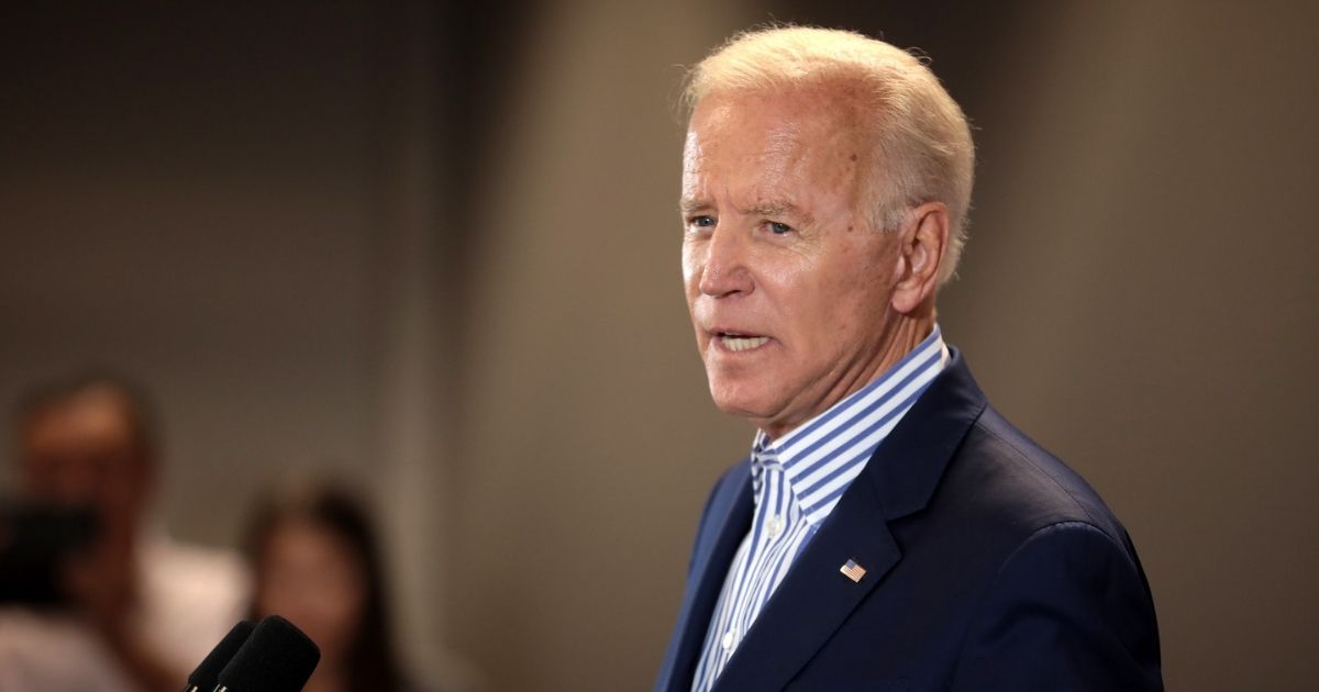 Former Vice President of the United States Joe Biden speaking with supporters at a town hall hosted by the Iowa Asian and Latino Coalition at Plumbers and Steamfitters Local 33 in Des Moines, Iowa.