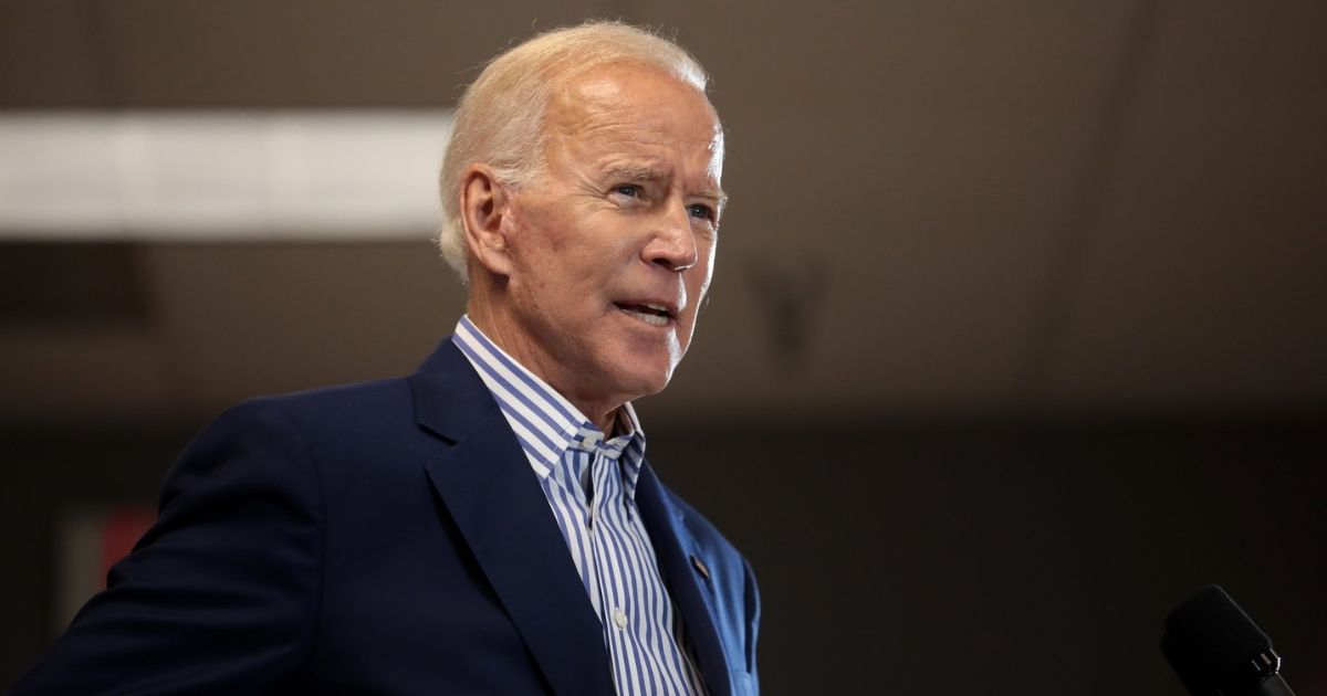 Former Vice President of the United States Joe Biden speaking with supporters at a town hall hosted by the Iowa Asian and Latino Coalition at Plumbers and Steamfitters Local 33 in Des Moines, Iowa.