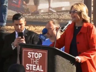 Kelli Ward speaks at a "Stop the Steal" rally in Arizona.