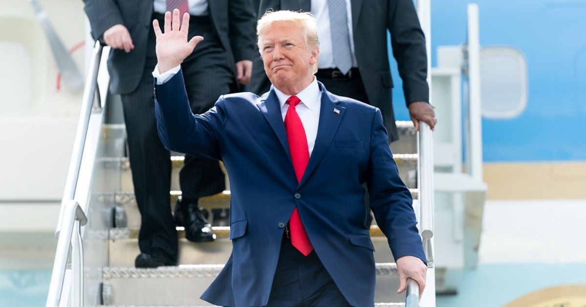 President Donald J. Trump disembarks Air Force One at Columbia Metropolitan Airport in Columbia, S.C. Friday, Oct. 25, 2019, as he is welcomed by local and state officials. (Official White House Photo by Shealah Craighead)