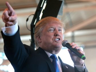 Donald Trump speaking with supporters at a hangar at Mesa Gateway Airport in Mesa, Arizona.