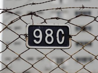 98c plate on fence