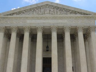 Supreme Court Building with a blue sky