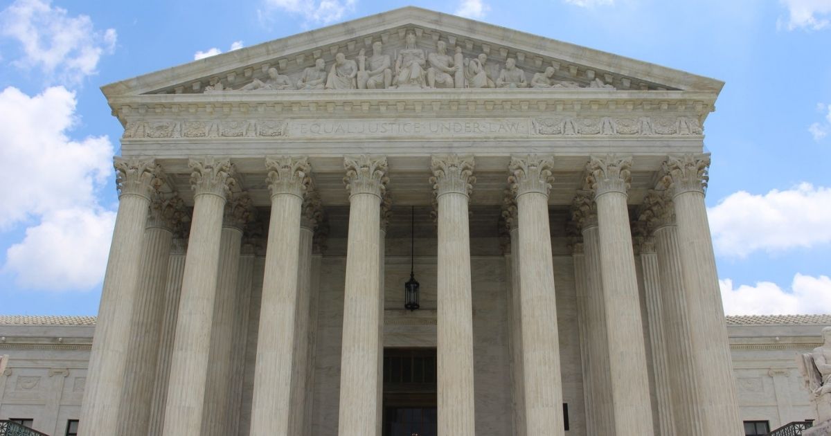 Supreme Court Building with a blue sky