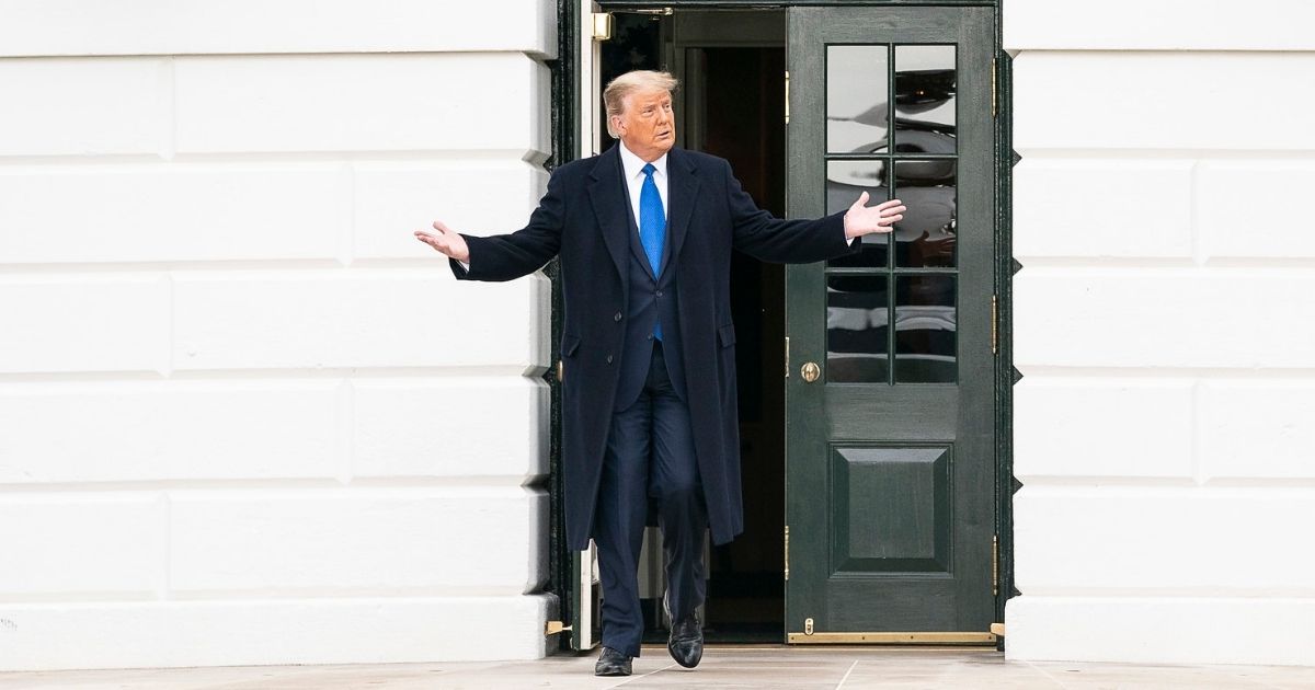 President Donald J. Trump greets guests on the South Lawn of the White House Tuesday, Oct. 27, 2020, prior to boarding Marine One en route to Joint Base Andrews, Md. to begin his trip to Michigan, Wisconsin, Nebraska and Nevada. (Official White House Photo by Joyce N. Boghosian)