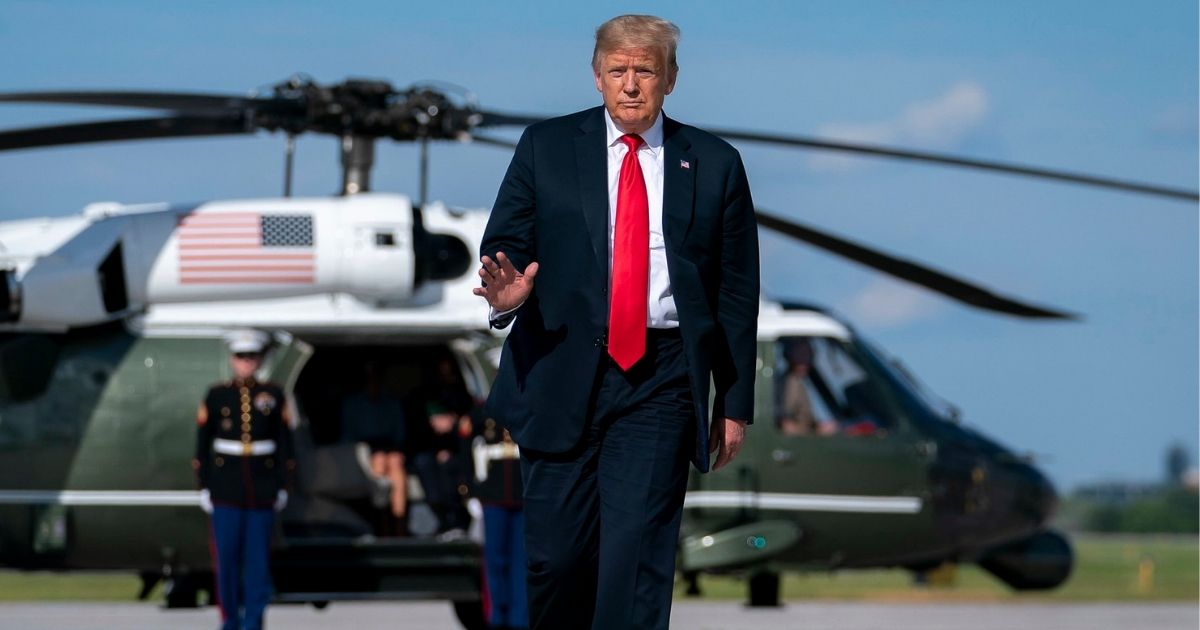 President Donald J. Trump arrives at Green Bay-Austin Straubel International Airport in Green Bay, Wis. Thursday, June 25, 2020, and boards Air Force One en route to Joint Base Andrews, Md. (Official White House Photo by Tia Dufour)