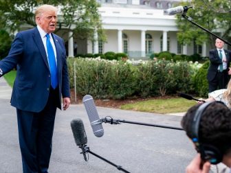 President Donald J. Trump talks to members of the press along the South Lawn driveway Thursday, Sept. 24, 2020, prior to boarding Marine One en route to Joint Base Andrews, Md. to begin his trip to North Carolina and Florida. (Official White House Photo by Tia Dufour)