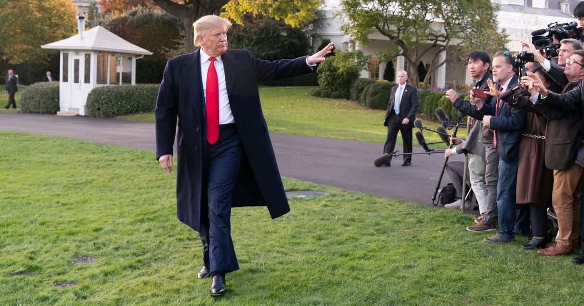 President Donald J. Trump waves after talking with reporters on the South Lawn of the White House Monday, Nov. 4, 2019, and walks to board Marine One to begin his trip to Kentucky. (Official White House Photo by Joyce N. Boghosian)