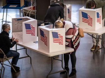 Voters in Des Moines precincts 43, 61 and 62 cast their ballots at Roosevelt High School.