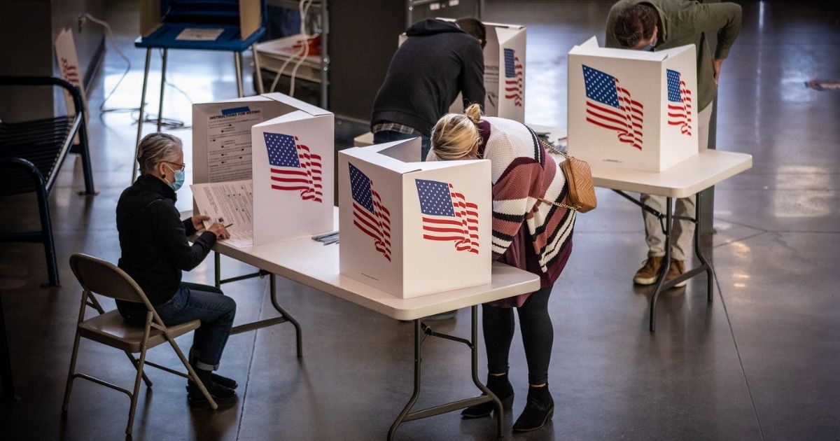 Voters in Des Moines precincts 43, 61 and 62 cast their ballots at Roosevelt High School.