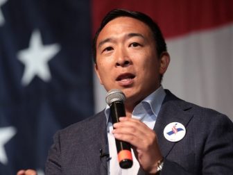 Andrew Yang speaking with attendees at the 2019 Iowa Democratic Wing Ding at Surf Ballroom in Clear Lake, Iowa.