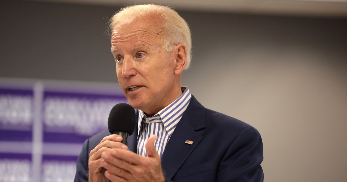 Former Vice President of the United States Joe Biden speaking with supporters at a town hall hosted by the Iowa Asian and Latino Coalition at Plumbers and Steamfitters Local 33 in Des Moines, Iowa.