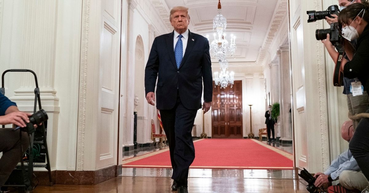 President Donald J. Trump walks into the East Room of the White House to address his remarks on Operation Legend: Combatting Violent Crime in American Cities Wednesday, July 22, 2020, at the White House. (Official White House Photo by Shealah Craighead)