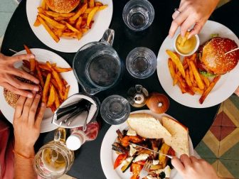 Friends eating lunch at a diner