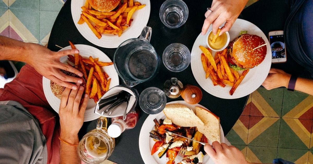 Friends eating lunch at a diner